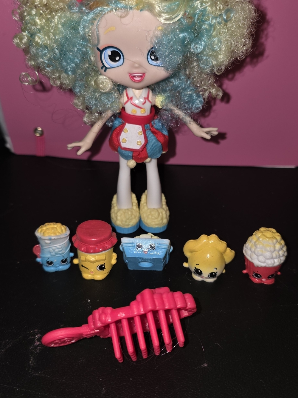 Shopkins Curly-Haired Doll with Blue, Yellow & Pink Accessories